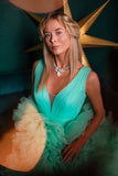 Mint green beaded necklace with a floral pendant featuring pastel green, pink, white gemstones set in gold – part of the Paradise Floral collection by Sildare Jewelry.