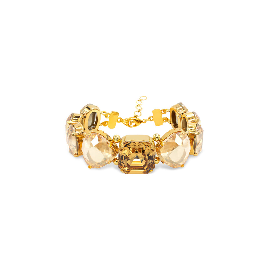 Elegant and radiant gold plated bracelet with large faceted crystals from the ÉCLAT Collection by Sildare Jewelry – capturing luxury, brilliance, and timeless glamour.