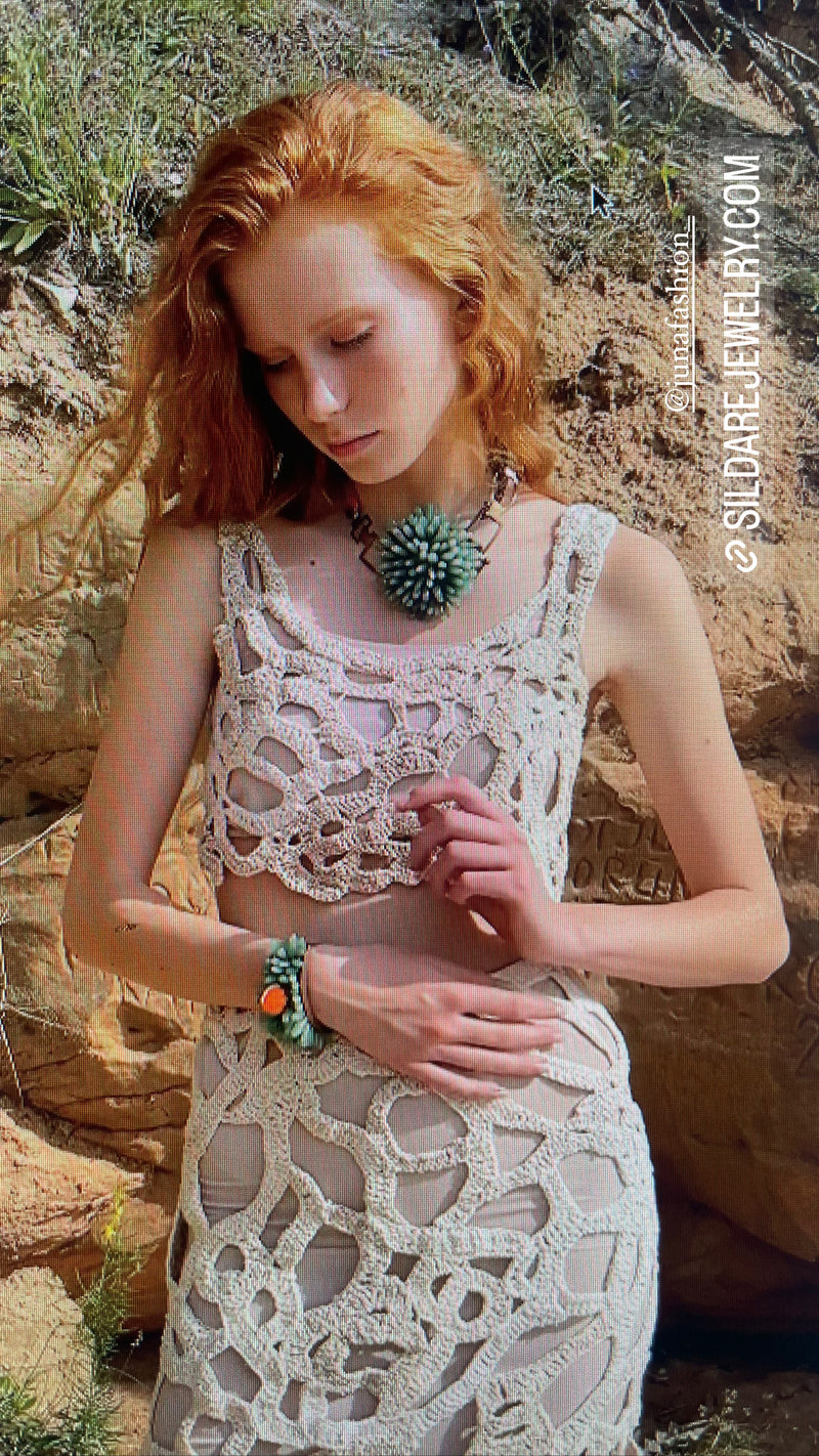 Bronze necklace with a floral hedgehog with an appel and date pendant featuring green, orange nephritis gemstone in bronze. Jewelry set- necklace and bracelet – part of the Paradise Floral collection by Sildare Jewelry.