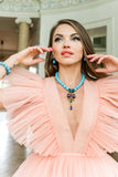 Luxury turquoise gemstone necklace with a multicolor sculptural pendant featuring blue, purple, orange, green, and teal stones — quiet radiance, modern artistic elegance, intimate poetic presence; perfect for refined occasions, evening looks, gallery events, and elevated daytime style; handcrafted one‑of‑a‑kind jewelry by SILDARE Jewelry