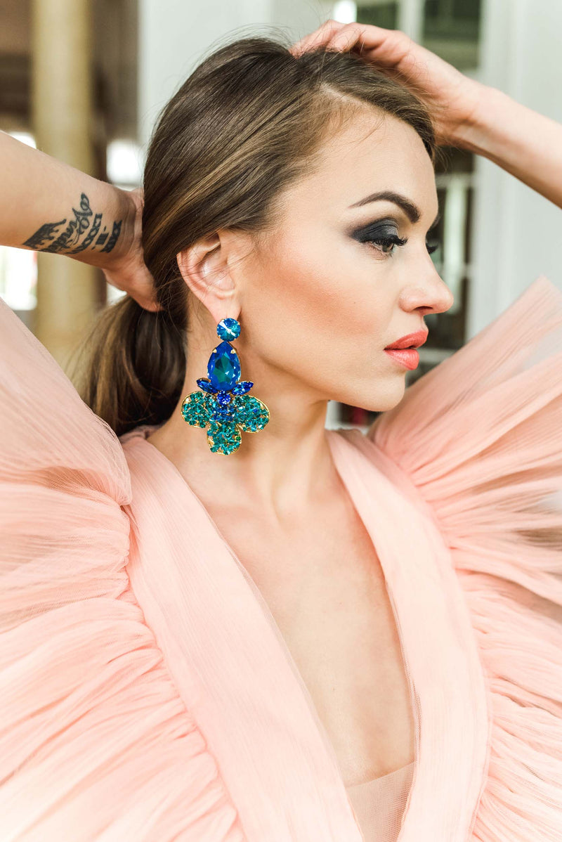 Luxury 24‑carat gold‑plated blue and green crystal statement earrings with high‑precision Austrian crystals — bold contrast, deep tones, quiet elegance, refined feminine strength; perfect for weddings, evening events, party outfits, and elevated night‑out looks; handcrafted one‑of‑a‑kind jewelry by SILDARE Jewelry