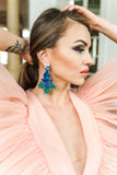 Luxury 24‑carat gold‑plated blue and green crystal statement earrings with high‑precision Austrian crystals — bold contrast, deep tones, quiet elegance, refined feminine strength; perfect for weddings, evening events, party outfits, and elevated night‑out looks; handcrafted one‑of‑a‑kind jewelry by SILDARE Jewelry