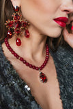 Luxury 24‑carat gold‑plated red crystal statement earrings with high‑precision Austrian crystals — bold contrast, vibrant tones, quiet elegance, refined feminine strength; perfect for weddings, evening events, party outfits, and elevated night‑out looks; handcrafted one‑of‑a‑kind jewelry by SILDARE Jewelry