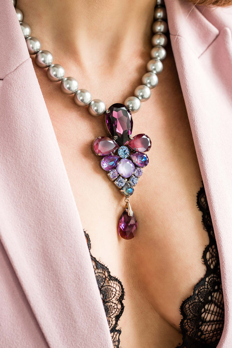 Silver pearl crystal necklace with a sculptural central motif, worn for elegant evening looks and refined occasions; handcrafted one‑of‑a‑kind jewelry by SILDARE Jewelry.