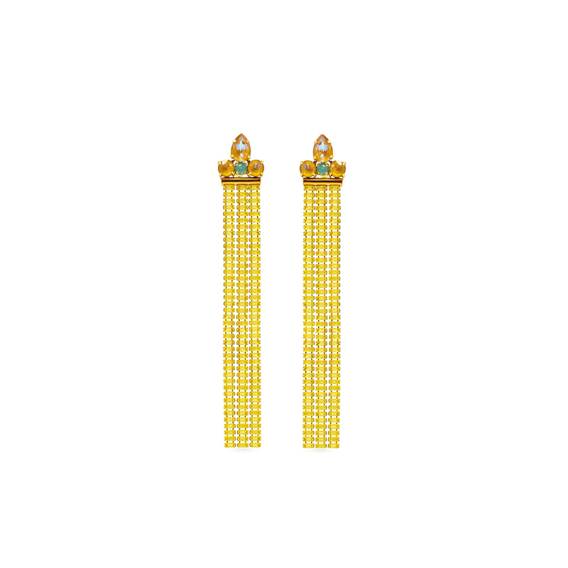A pair of gold-toned dangle earrings with a small green and clear stone crown detail at the top, hanging from five strands of small clear stones, shown on a plain white background.