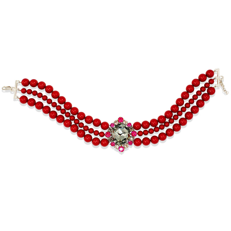 A red beaded pearl silver plated choker necklace with three strands, featuring a central silver-toned floral cluster with pink and clear rhinestones, shown on a plain white background.