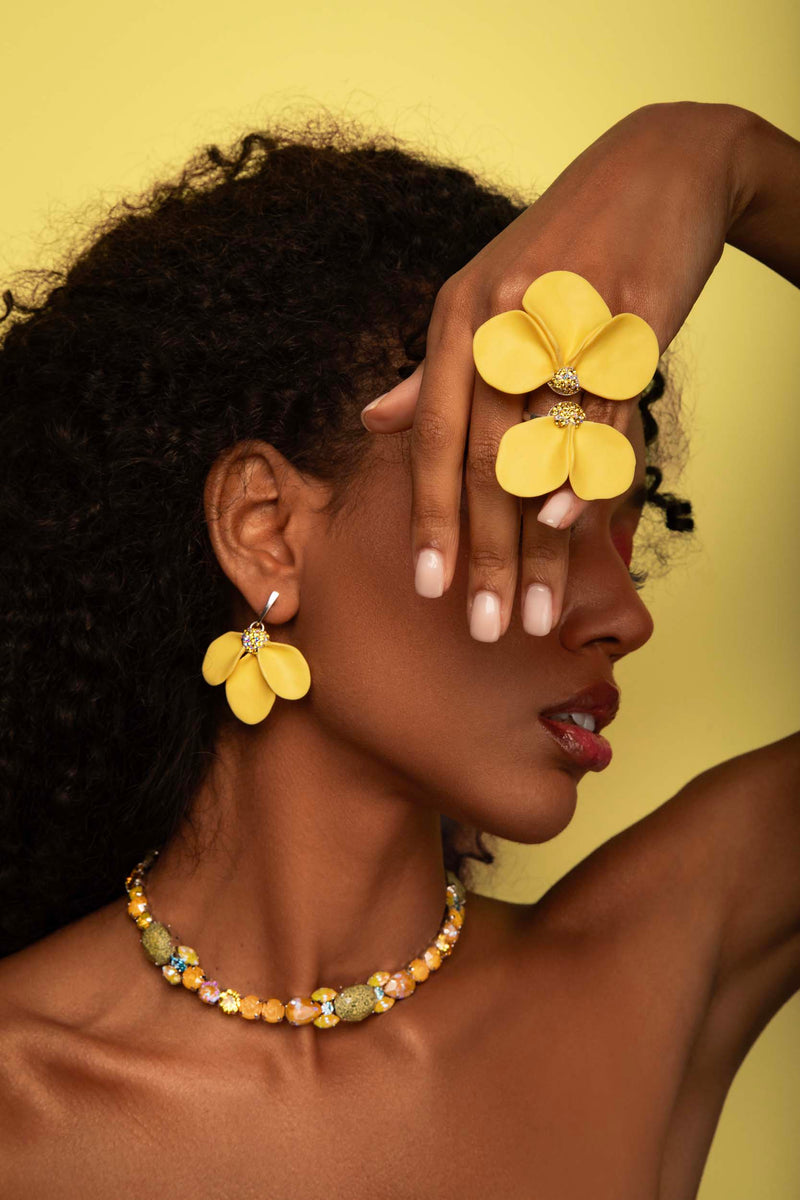 Yellow crystal statement necklace with silver‑plated finish, worn as an elegant accessory for refined, expressive style; handcrafted one‑of‑a‑kind jewelry by SILDARE Jewelry