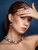 Luxury gold‑tone colorful crystal statement earrings with high‑precision Austrian crystals — minimalist sculptural design; handcrafted one‑of‑a‑kind jewelry by SILDARE Jewelry, vibrant statement earrings for refined feminine style