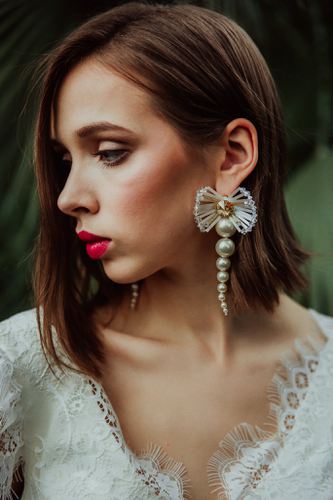 Elegant bridal statement earrings with pearls and clear Austrian crystals in floral design, gold-plated finish. Perfect for weddings or formal occasions - Sildare Jewelry