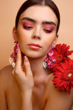 Malvie magazine-paris Bold floral statement earrings crafted with Pink Austrian crystals and silver plated finish. Inspired by blooming paradise gardens.
Handcrafted luxury jewelry by Sildare