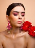 Malvie magazine Paris. Bold floral statement earrings crafted with Pink Austrian crystals and silver plated finish. Inspired by blooming paradise gardens.
Handcrafted luxury jewelry by Sildare
