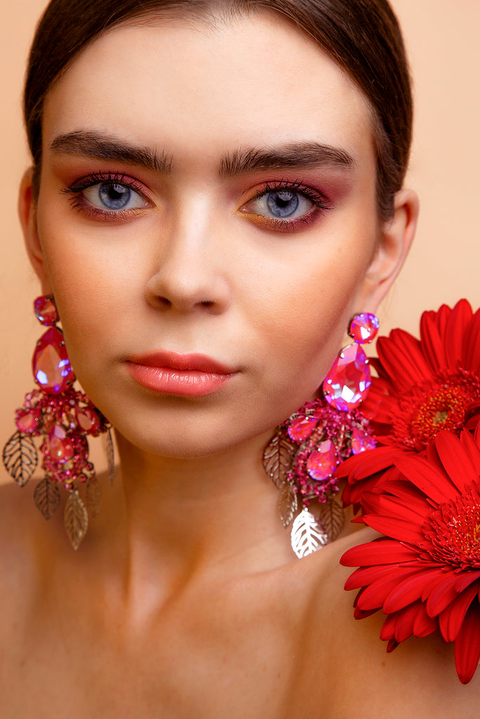 Malvie magazine Paris Bold floral statement earrings crafted with Pink Austrian crystals and silver plated finish. Inspired by blooming paradise gardens.
Handcrafted luxury jewelry by Sildare