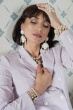 White Swarovski pearl gold tone bracelet