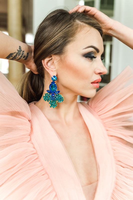 Bold floral statement earrings with sapphire blue and turquoise
Austrian crystals, inspired by paradise garden blooms.
Handcrafted luxury jewelry by Sildare 