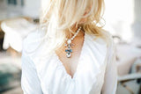 SILDARE Jewelry a Baroque style handmade necklace with a gold-plated pendant featuring white pearls and Austrian crystals.